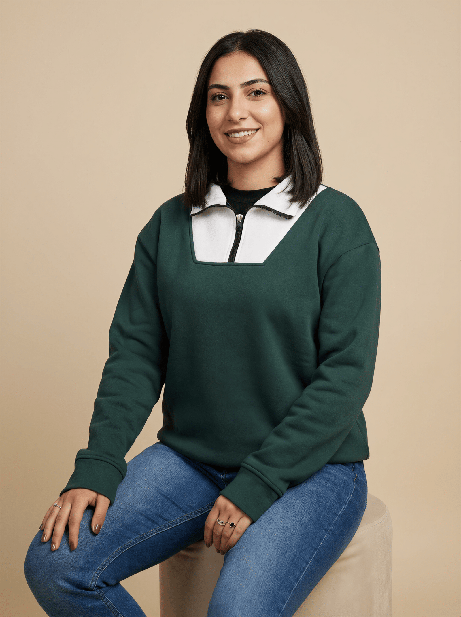 pull vert foncé visage